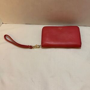 Fossil pink/coral wristlet with orange lining